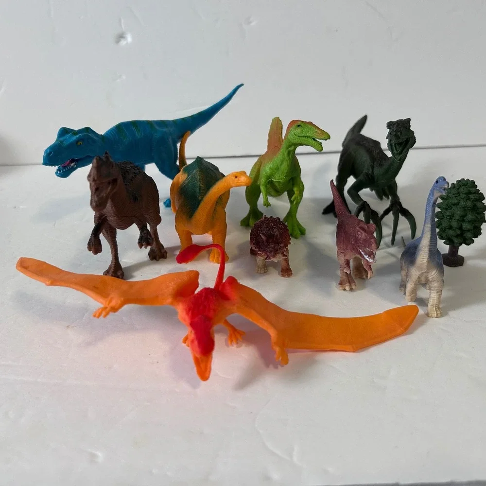 UsedAssorted Plastic Dinosaur Figures Lot of 9 with Tree Toy Prehistoric Animals